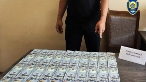 Andijonda Kanadaga ishga jo‘natishni va’da qilib, minglab dollar talab qilgan firibgar qo‘lga tushdi